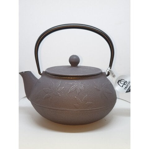 antique iron teapot